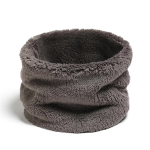 Close-up of grey plush neck warmer showing soft coral fleece texture and thick material
