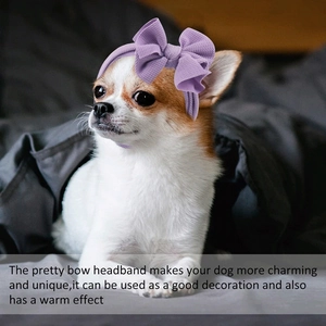 Detail of a purple knitted pet headband featuring a large double-layered bow for small dogs