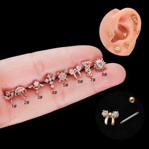 Miniature zircon piercing studs set in stainless steel with ball back screw and various shapes