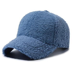 Navy blue faux lamb wool baseball cap with soft curly texture for winter warmth