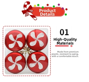 Detail of red Christmas ornaments with white glitter swirls and golden hooks