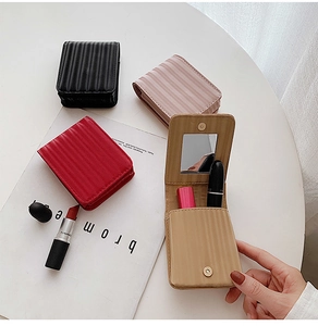 Mini portable leather lipstick pouches in multiple colors with built-in mirror detail