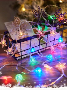 Close-up of LED string lights with star and bubble globe shapes in vibrant multi-color