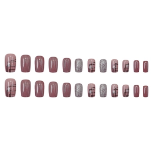 Elegant almond French press-on nails in rose pink with glitter and geometric lines