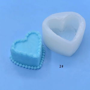 Heart-shaped silicone DIY mold for cakes and chocolates with blue embossed plaster sample