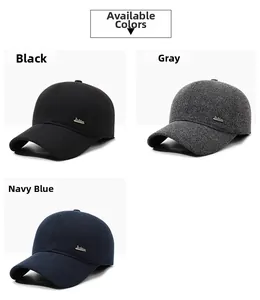 Detail of knit textured winter baseball cap with ear protection and metal logo