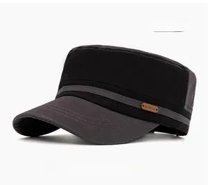 Detail view of cotton military flat cap with grey contrast peak and side leather patch