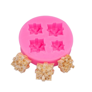 Pink silicone mold for gift box shaped fondant and chocolates with 3D bow details