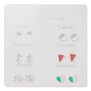 6-pair set of fresh silver stud earrings with hearts and bows on a weekly card