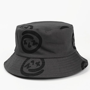 Close-up of dark grey bucket hat featuring street style graffiti print on cotton twill fabric