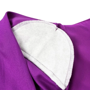 Detail shot of the shoulder structure with built-in foam padding on the purple dress