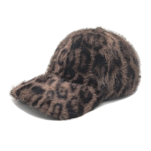 Detailed close-up of a stylish leopard print faux fur baseball cap with plush texture