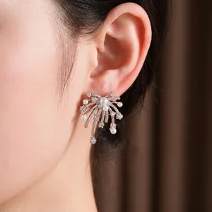 Elegant silver fireworks earrings featuring shimmering zircons and white pearls for women