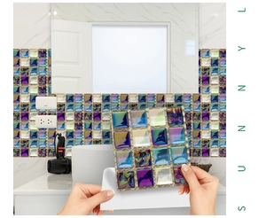 Detailed application of colorful mosaic tile stickers on a bathroom backsplash wall