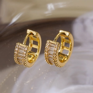 Gold plated baguette-cut cubic zirconia huggie earrings with side micro-pave accents