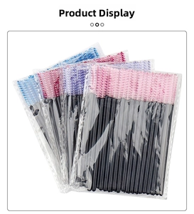 Detail view of multi-color disposable eyelash brushes in organized transparent bags