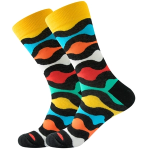 Detail showing vibrant wave striped patterns in multiple colors on a stylish crew sock