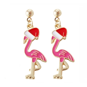Detail of flamingo earrings wearing Christmas hats with pink enamel and gold alloy finish