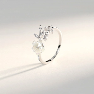 Adjustable S925 silver open ring with mother of pearl flower and sparkling zircon leaves