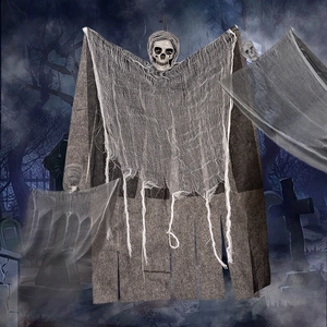 Halloween hanging ghost decor with skeleton head and shredded gauze in spooky cemetery scene