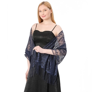 Detail of navy blue lace shawl featuring complex floral patterns and long fringe accents