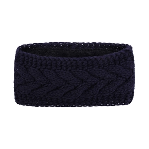 Close-up of navy blue cable knit headband with warm black fleece lining texture