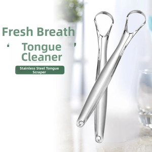 Close-up of dual-pack stainless steel U-shaped tongue scrapers for oral hygiene