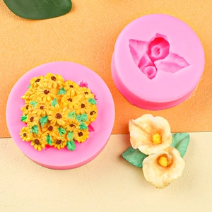 Detailed pink silicone mold for camellia and sunflower fondant cake decorations