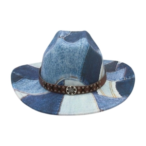 Detail of blue and white patchwork denim cowboy hat with leather band and studs
