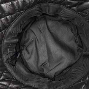 Detail view of the quilted bucket hat inner lining with adjustable drawstrings