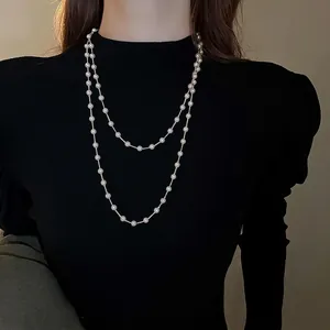 Collier double rang en perles artificielles vintage français avec chaîne dorée élégante
