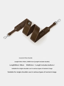 Detail of adjustable caramel leather wide bag strap with silver metal swivel hooks