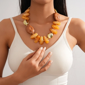 Statement acrylic amber beaded necklace with irregular geometric stone texture for women