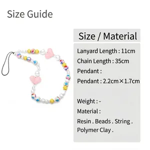 Bijou de téléphone perlé avec pendentif cœur en résine et guide des tailles détaillé