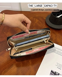 Detail of internal multi-card slots and large capacity smartphone compartment in long wallet