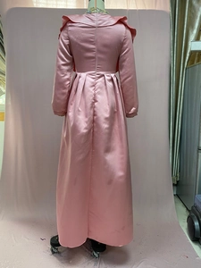 Detail of pink satin evening gown back view with ruffle collar and silver sequin accents
