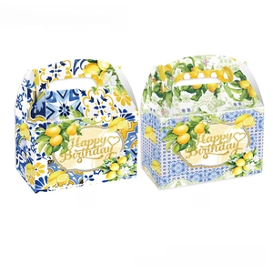 Detail of 12 lemon birthday gift bags featuring Mediterranean tile patterns and gold lettering