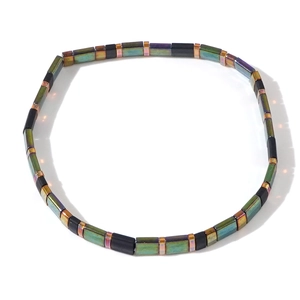 Bohemian Tila bead stretch bracelet with green iridescent and matte black beads