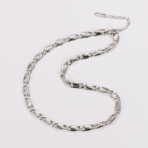 Close-up of S925 sterling silver paperclip chain necklace with lobster clasp and tag