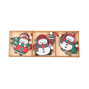 Three wooden Christmas snowman ornaments set in red, green and white colors with hanging ropes