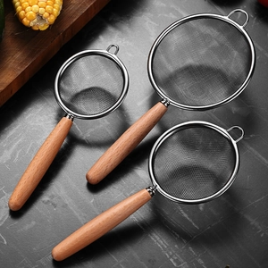 Three sizes of stainless steel mesh strainers with wooden handles for kitchen filtering