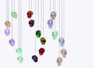 Hanging Halloween decorative lights featuring colorful LED glowing skull wind chimes