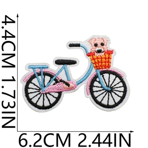 Close-up of blue bicycle embroidery patch with pink animals, size 4.4x6.2cm details