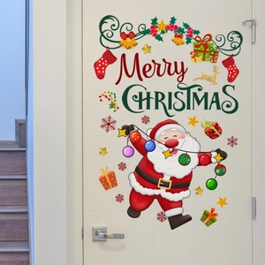 Christmas wall stickers with Santa and Merry Christmas text on a white wooden door decor