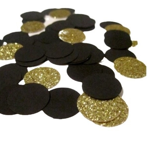 Black and gold graduation party confetti with glitter circles for table decoration