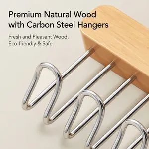 Wall-mounted retractable closet organizer made of natural wood and carbon steel rails
