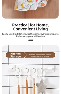Detail of white multi-functional hook rack showing four S-hooks for kitchen wall storage