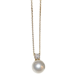 Elegant gold necklace featuring a round zircon pendant and a large white pearl drop