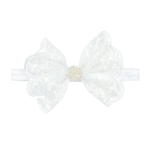 White lace bow headband for babies with elegant faux pearls and rhinestone accents