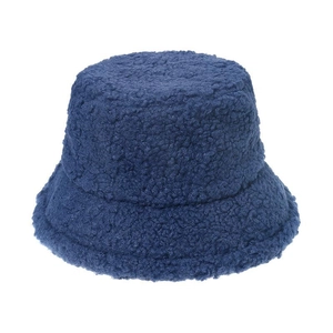 Close-up detail of thick navy blue fleece bucket hat showing warm lamb wool texture